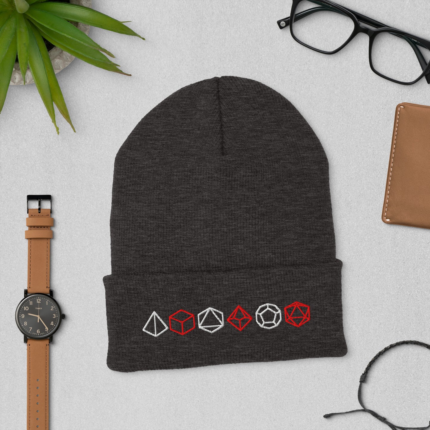 Unisex TTRPG Dice Beanie in Gray with Embroidered Polyhedral Dice Design.