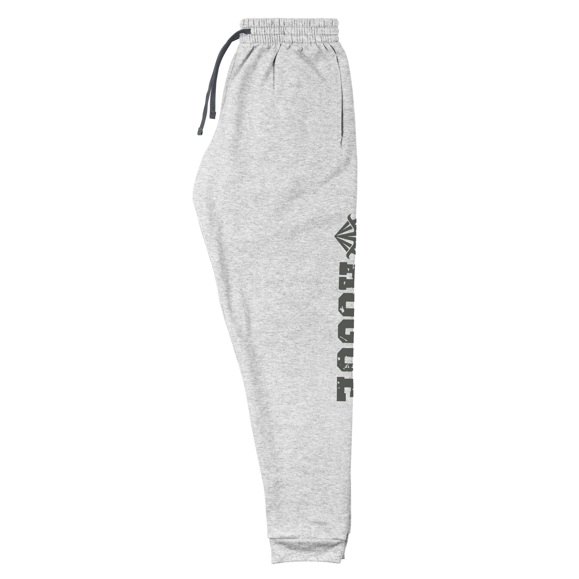 dnd rogue joggers crafted from a luxurious blend of 60% cotton and 40% polyester pre-shrunk fleece, featuring a soft and durable fabric weight of 7.2 oz/yd² (244 g/m²). Designed with a tapered fit, lower rise in the front, and longer rise in the back for optimal movement. Includes an elastic waistband with external drawcord for a customizable fit, 1×1 rib cuffs with spandex for stretch and recovery, and stylish side pockets. The joggers are adorned with a bold 'rogue' graphic on the left leg